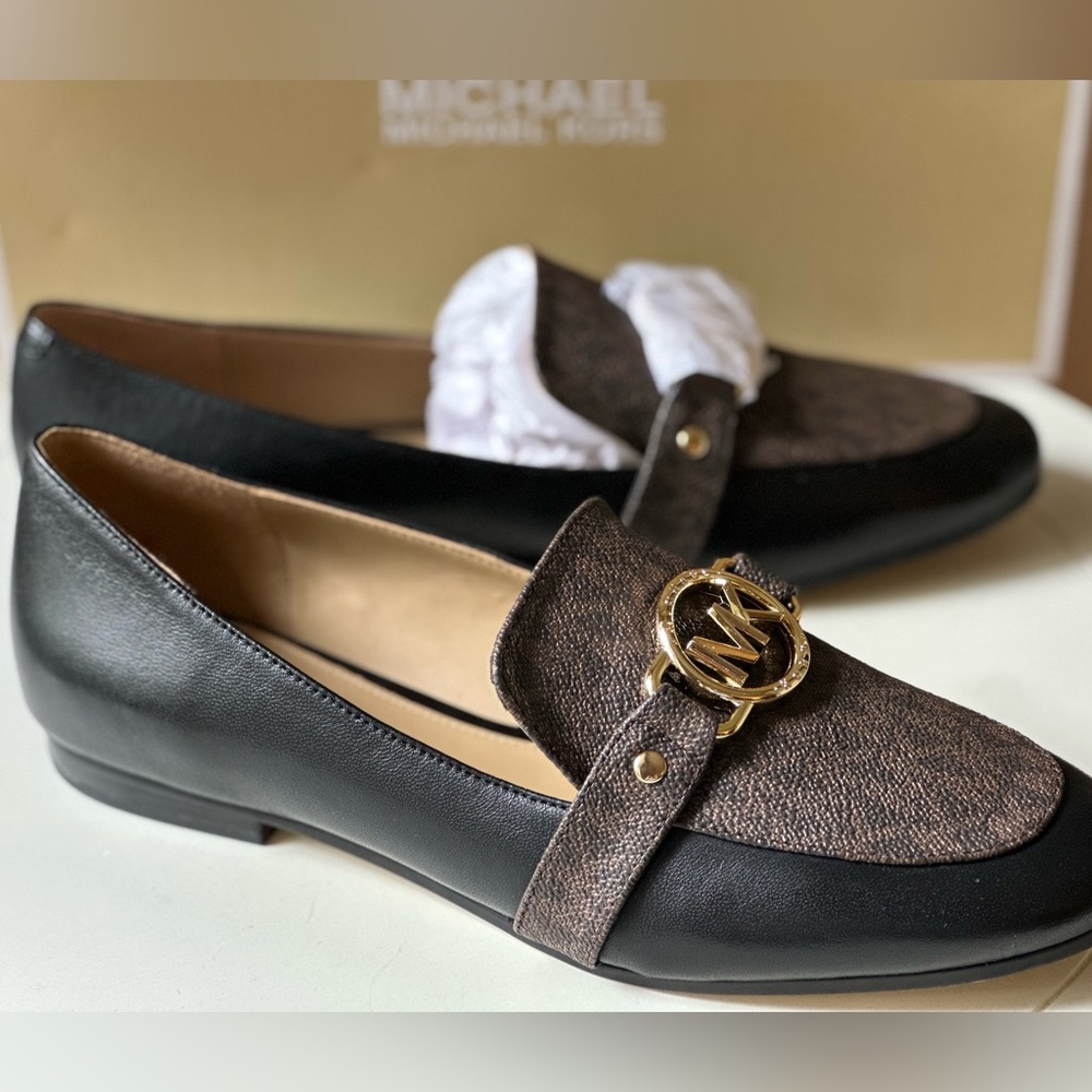 Brand New with box Michael Kors loafers. Brown and black size 7.